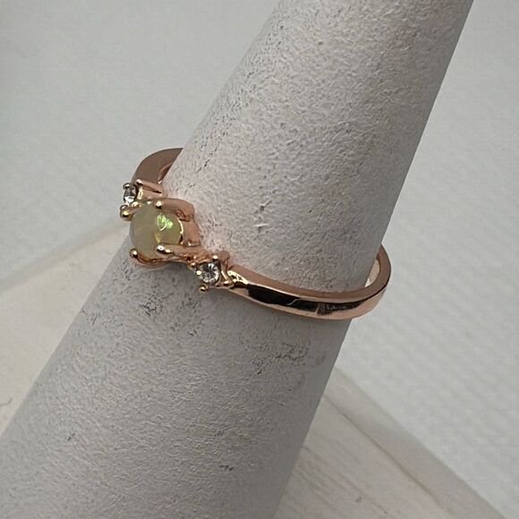 Brand New!! Size 7 ring with faux opal center stone and two flanking zircon ston - Picture 2 of 4